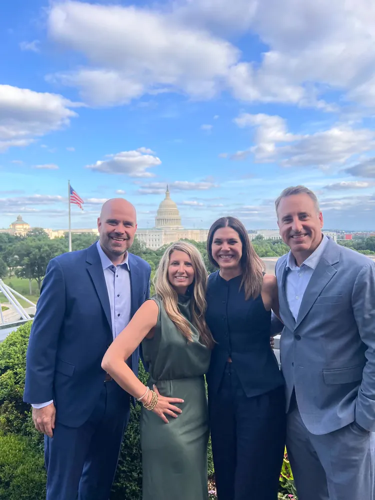 Continuum leaders in Washington, D.C., with the Capitol behind them