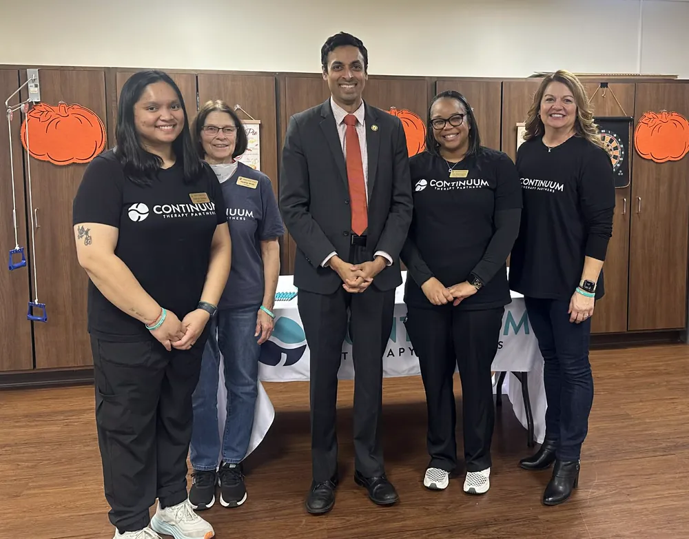 Continuum team members at a community event at a partner facility