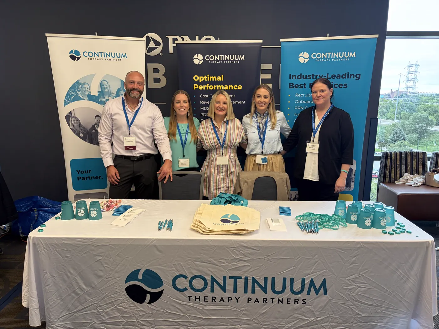 The Continuum team at its booth at an industry conference