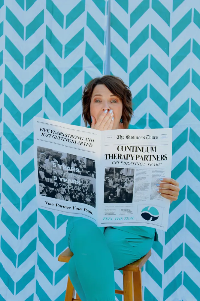 Reading the Continuum five-year anniversary newspaper