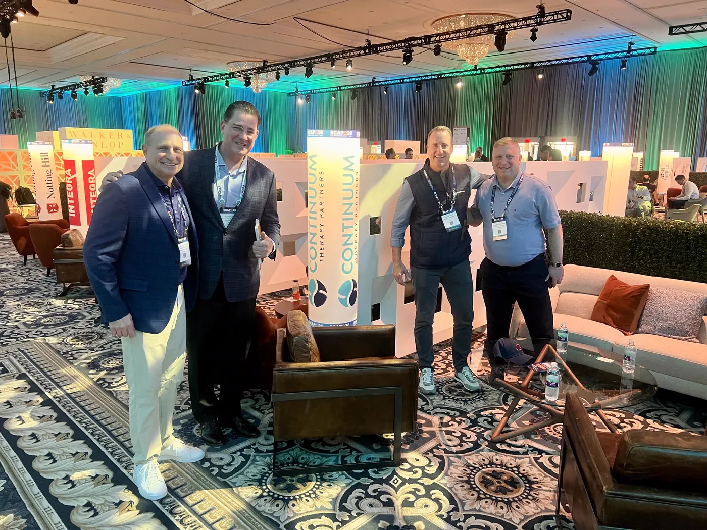 Continuum leaders at an industry conference